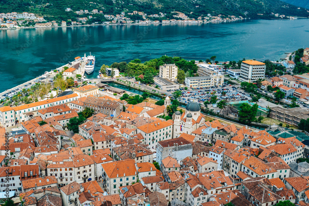 Panoramic view of port, town and mountains in Kotor, Montenegro