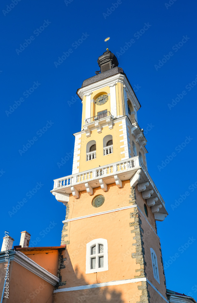 Kamianets-Podilskyi, Ukraine - October 20, 2016: Ancient Old Town Hall Tower in Kamianets-Podilskyi canyon, Ukraine. Europe landmarks. 