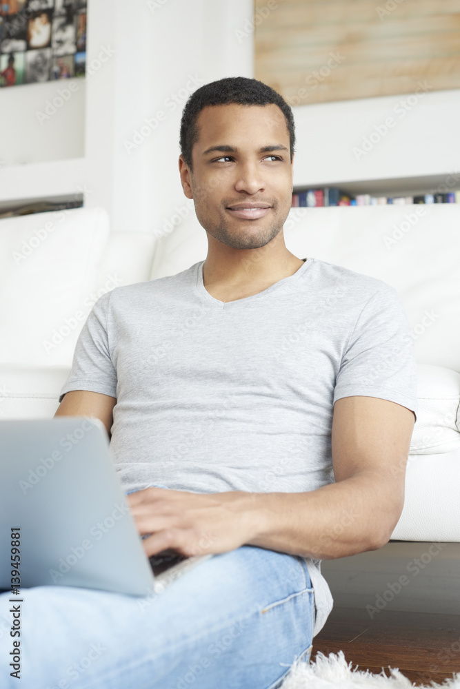 Home office is a good idea. Afro American businessman working online Home office is a good idea. Afro American businessman working online