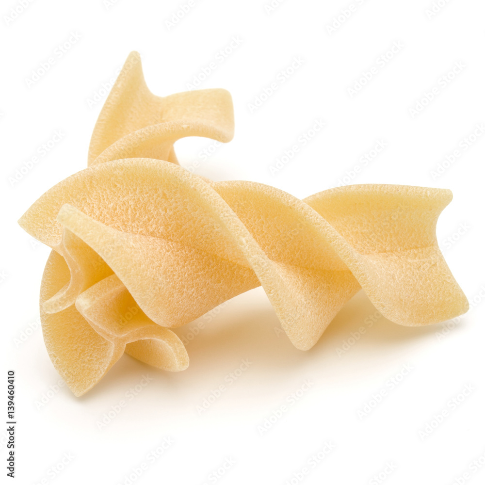 Italian twisted pasta fusilli isolated on white background. Fusilloni, rotini. Italian twisted pasta fusilli isolated on white background. Fusilloni, rotini.