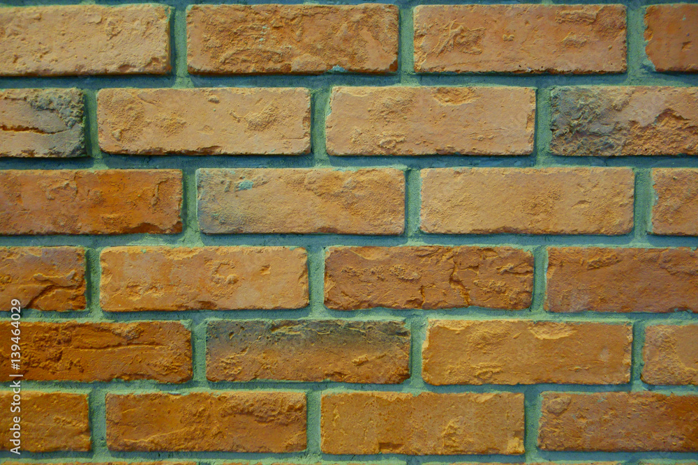 Fototapeta premium Old Pale Orange Green Brick Wall Texture. Vintage Background.