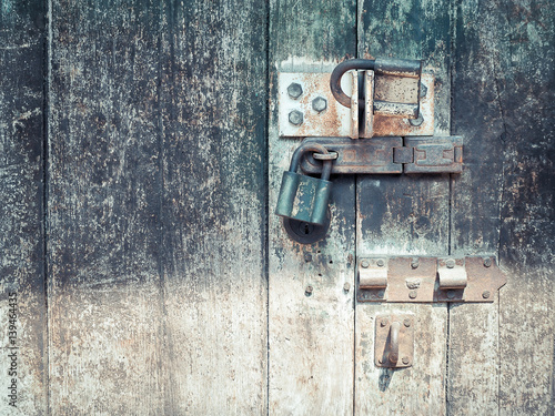 Old Padlock on Wooden Gate, Color filter with place your text © VICHAILAO