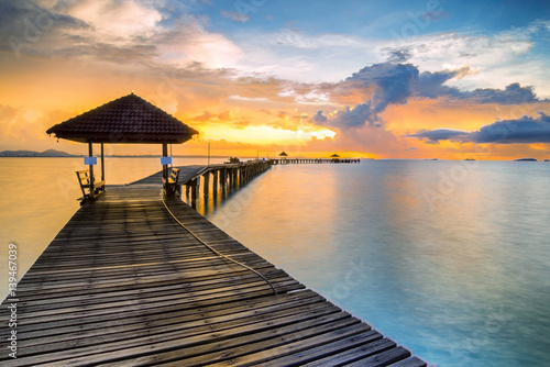 Seascape and bridge before sunrise