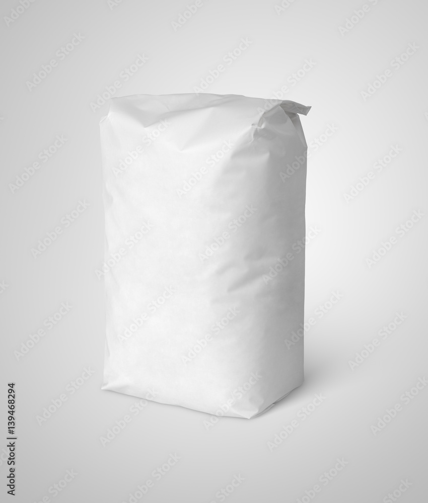 Blank white paper bag package of salt on gray with clipping path Blank white paper bag package of salt on gray with clipping path