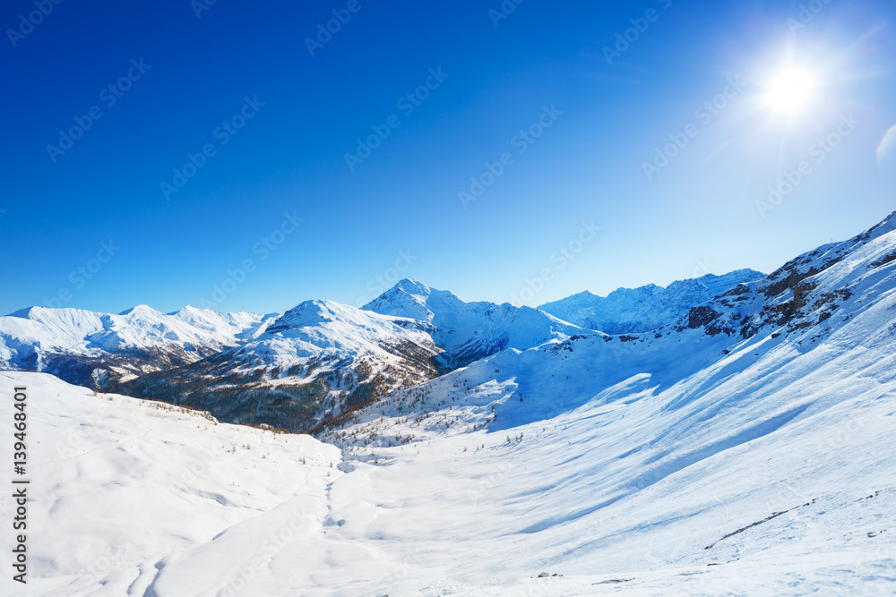 Beautiful snow-covered mountain peak in winter