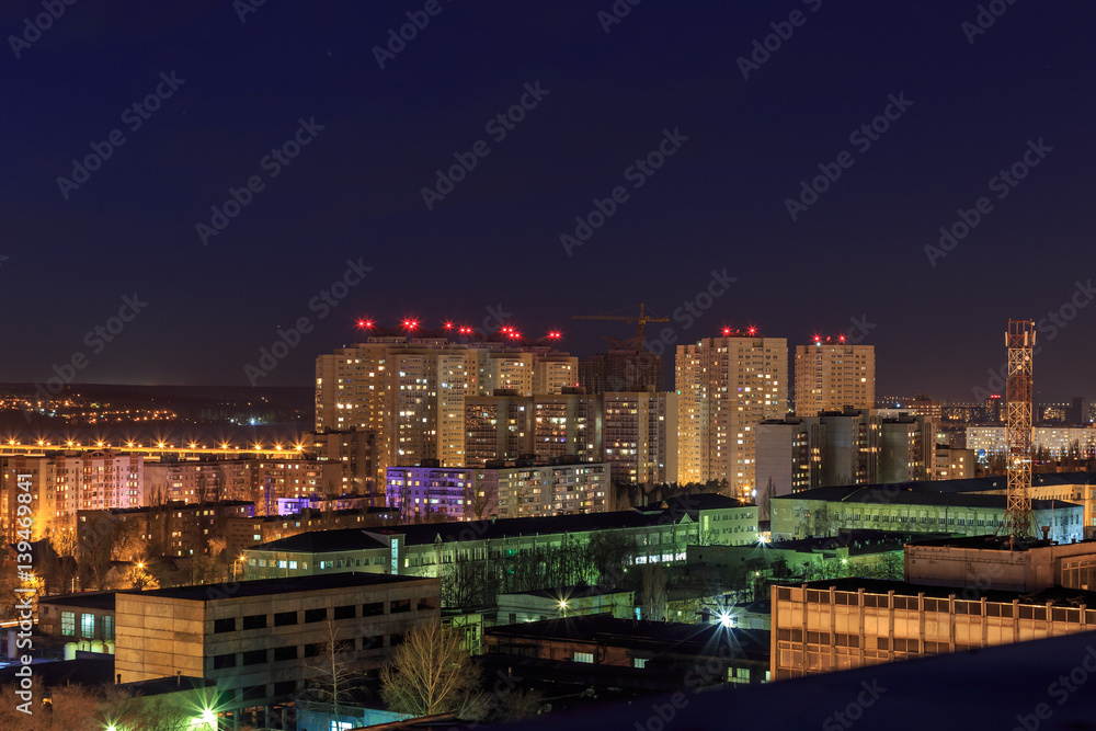 Night cityscape view to urban modern apartment buildings in Voronezh