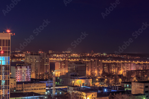 Night aerial cityscape view to urban modern apartment buildings in Voronezh  © DedMityay