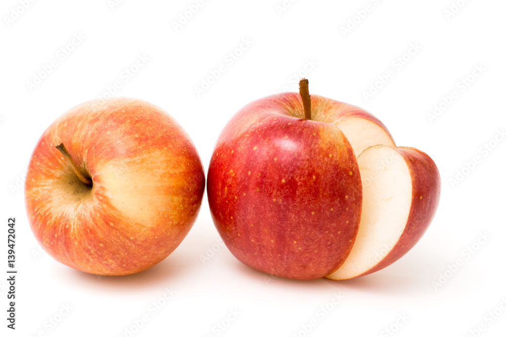 Ripe red apples on a white