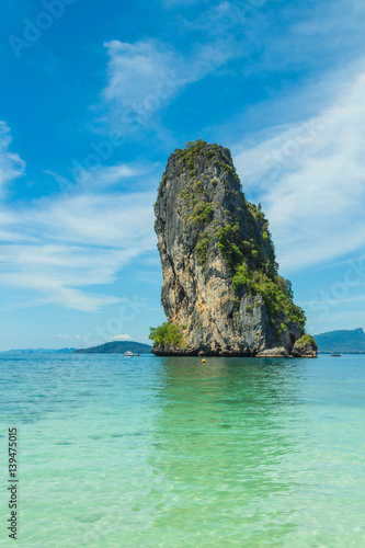 View from Koh Poda (Poda Island) to Ma Tang Ming rock with tourist boats in Andaman sea, Krabi province, Thailand.