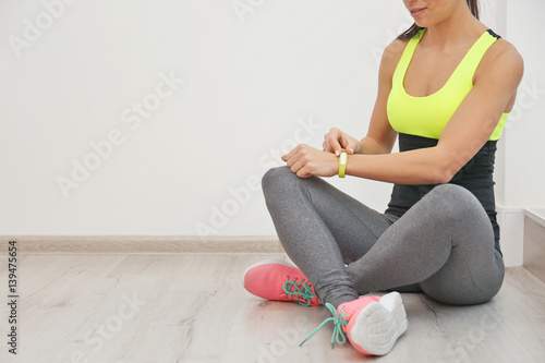 Sporty young woman with fit...