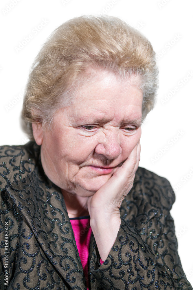 Portrait of old pensive, serious woman, leaning her head on her hand, isolated on white background Portrait of old pensive, serious woman, leaning her head on her hand, isolated on white background