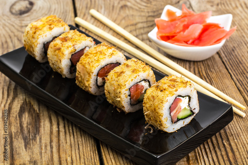 Japanese food rolls with fish and avocado