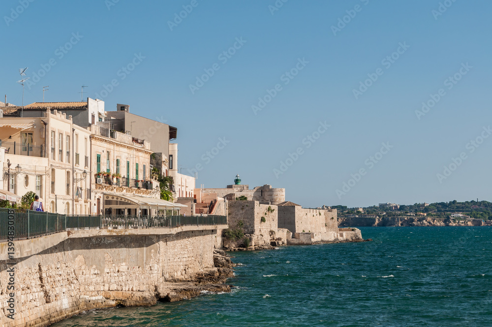 Coast of Ortigia island at city of Syracuse, Sicily, Italy.