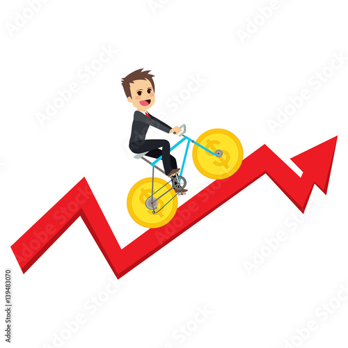 Young businessman riding gr...