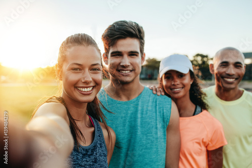Young friends doing selfie after jogging
