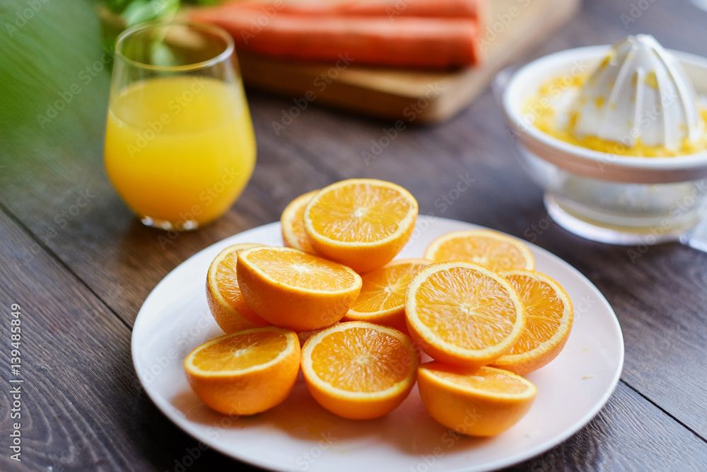 Orange juice in a glass and delicious carrot. Orange juice in a glass and delicious carrot.