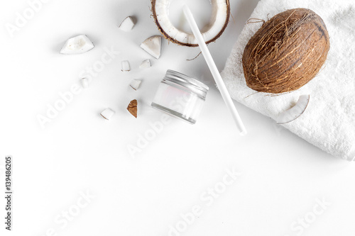 organic cosmetics with coconut on white background top view mockup