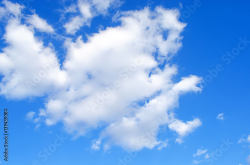 white cloud on background of blue sky a bright spring day in Ukraine