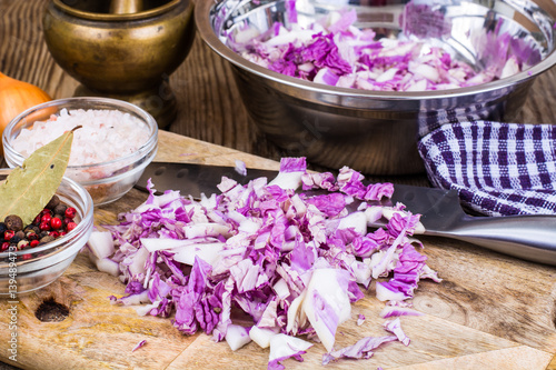 Chopped red cabbage in a metal bowl