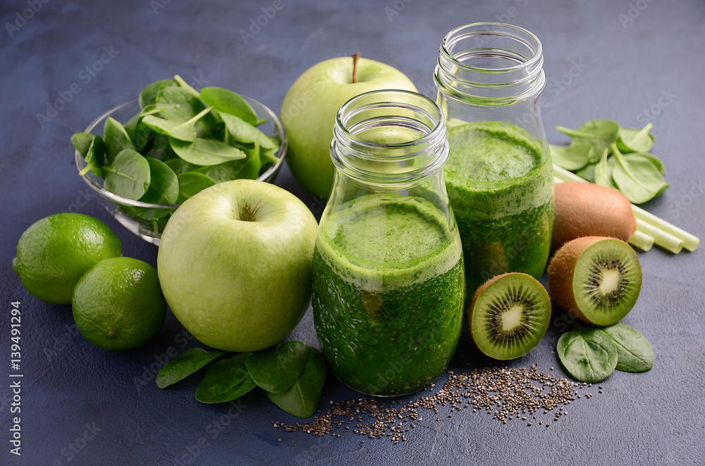 Healthy green smoothie with kiwi, apple, spinach and chia seeds. Healthy green smoothie with kiwi, apple, spinach and chia seeds.
