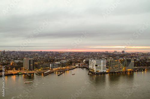 Dusk view over the river on to City of Amsterdam, Netherlands © Ruslans Golenkovs