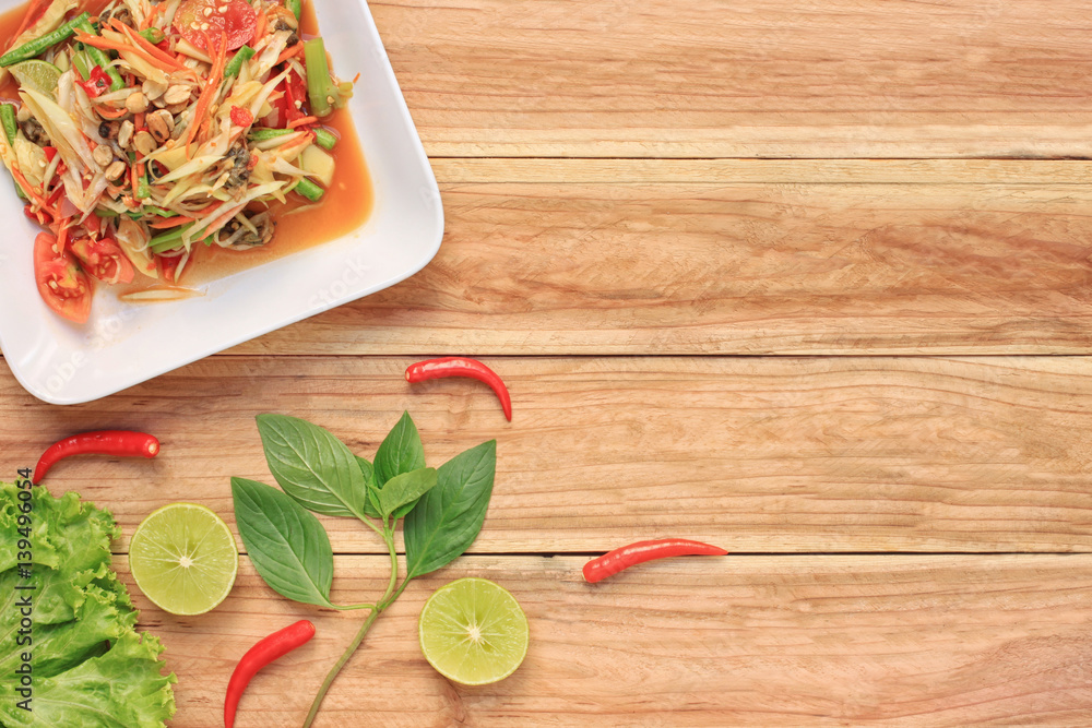 Top view Papaya salad of somtum in Thai food style for design diet background. Top view Papaya salad of somtum in Thai food style for design diet background.