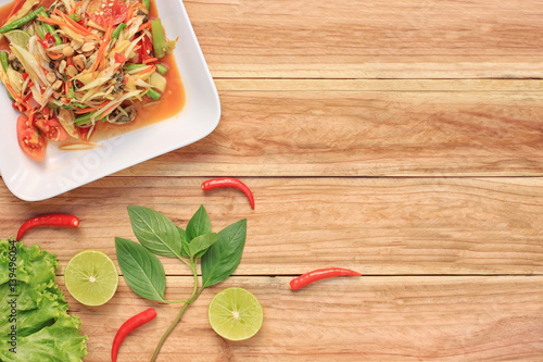Top view Papaya salad of somtum in Thai food style for design diet background. photo
