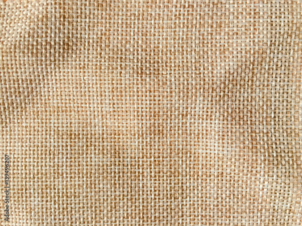 Closeup on texture of natural linen fabric background Closeup on texture of natural linen fabric background