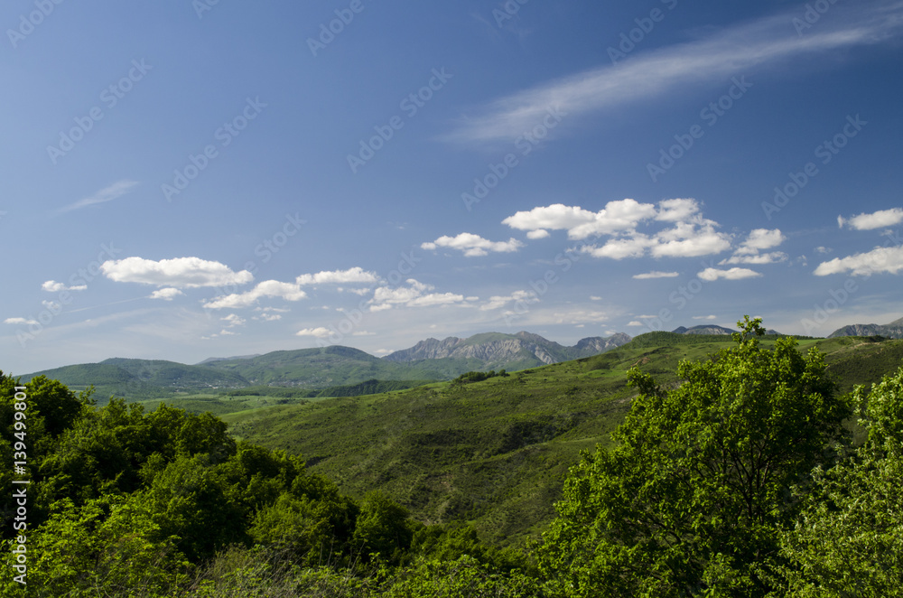 Green meadow in mountain. Composition of nature. Beautiful landscape of Big Caucasus spring view of nature. Spring in Azerbaijan. Shamakhi Ismailli Green meadow in mountain. Composition of nature. Beautiful landscape of Big Caucasus spring view of nature. Spring in Azerbaijan. Shamakhi Ismailli