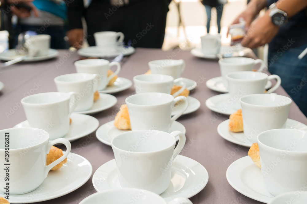 Cup of Coffee set with Dessert Prepare on the Table at Coffee brake time after meeting or Seminar Cup of Coffee set with Dessert Prepare on the Table at Coffee brake time after meeting or Seminar