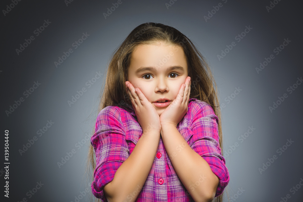 Closeup sad girl with worried stressed face expression Closeup sad girl with worried stressed face expression