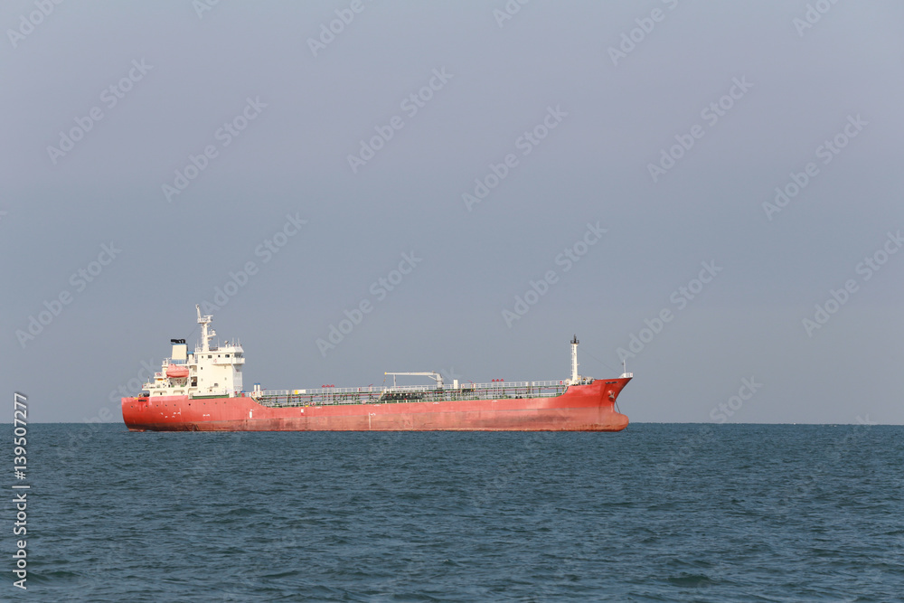 Marine cargo ship in sea.