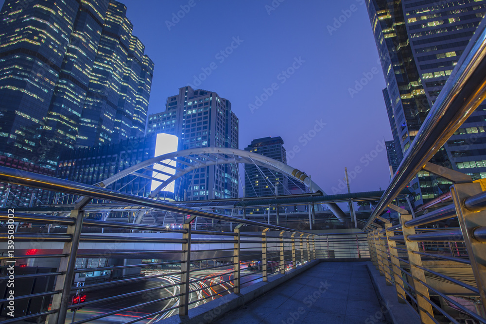 Fototapeta premium office building and traffic light in sathorn road silom most important business center in bangkok thailand capital