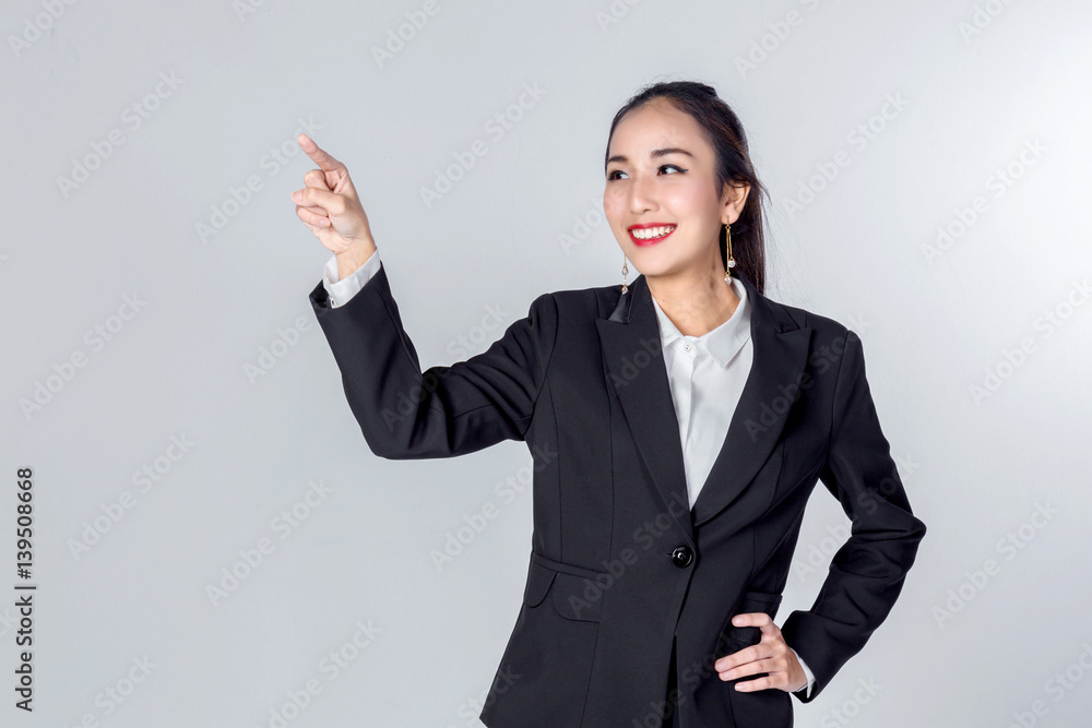 asian business woman smile and show hand point to free copyspace area for your text asian business woman smile and show hand point to free copyspace area for your text