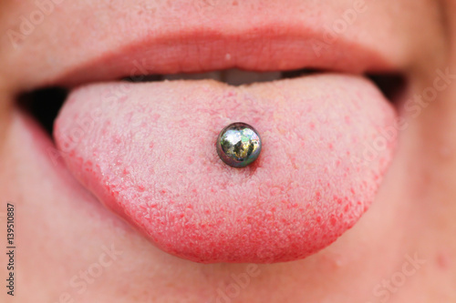 female mouth witht piercing photo