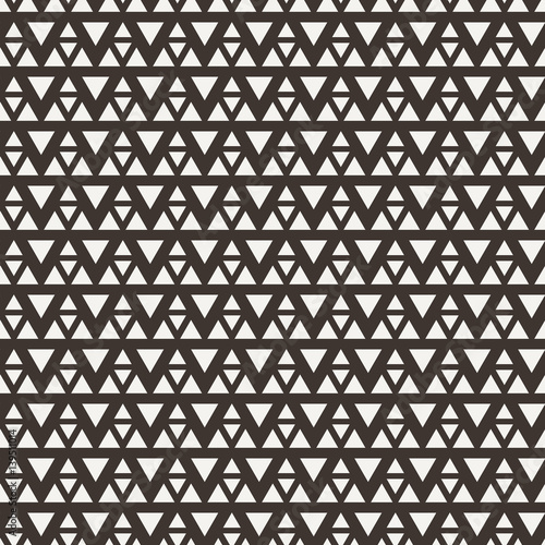 Seamless triangle halftone gradient pattern.