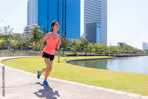 Woman running at bangkok city