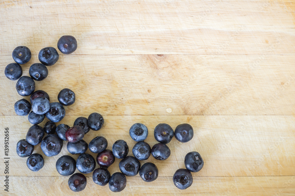 Top view of fresh blueberry on wooden background. Top view of fresh blueberry on wooden background.
