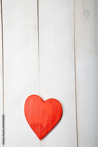 Heart on a white wooden background