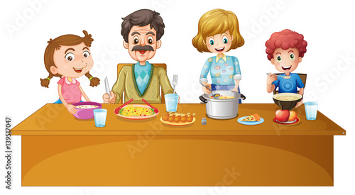Family members having dinner at the table