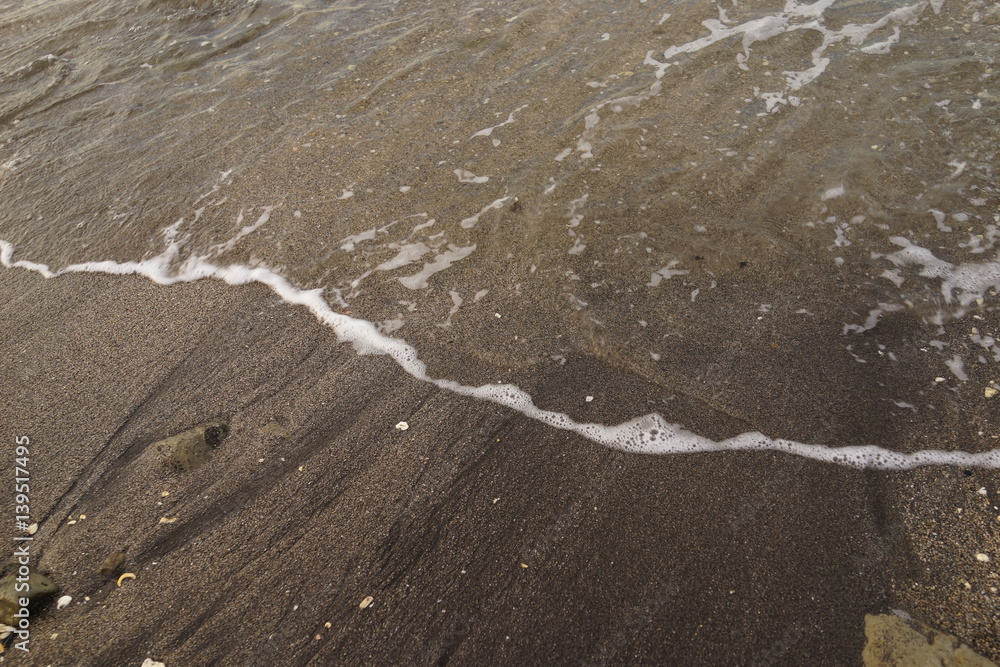 Obraz premium 波打ち際 波間 砂浜 小波 
