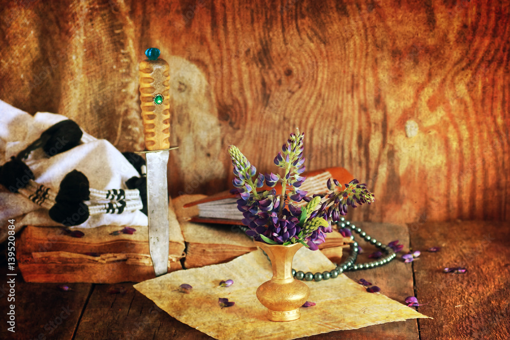 Fototapeta premium retro scratched effect concept arabian faith with book and flower