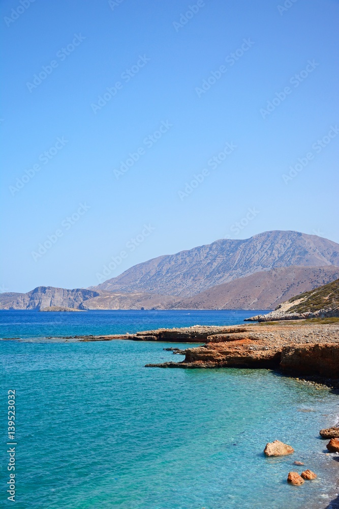 Fototapeta premium View of the beach and rugged coastline near Ammoudara,Crete.