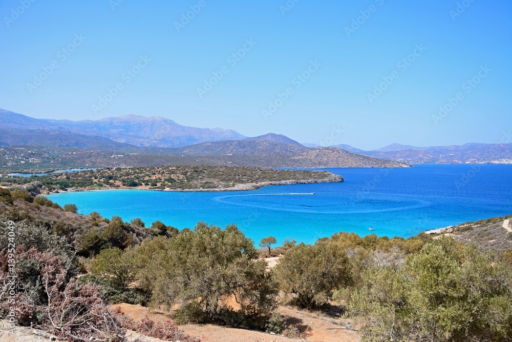 Elevated view of the sea and coastline with mountains to the rear, Istro, Crete.