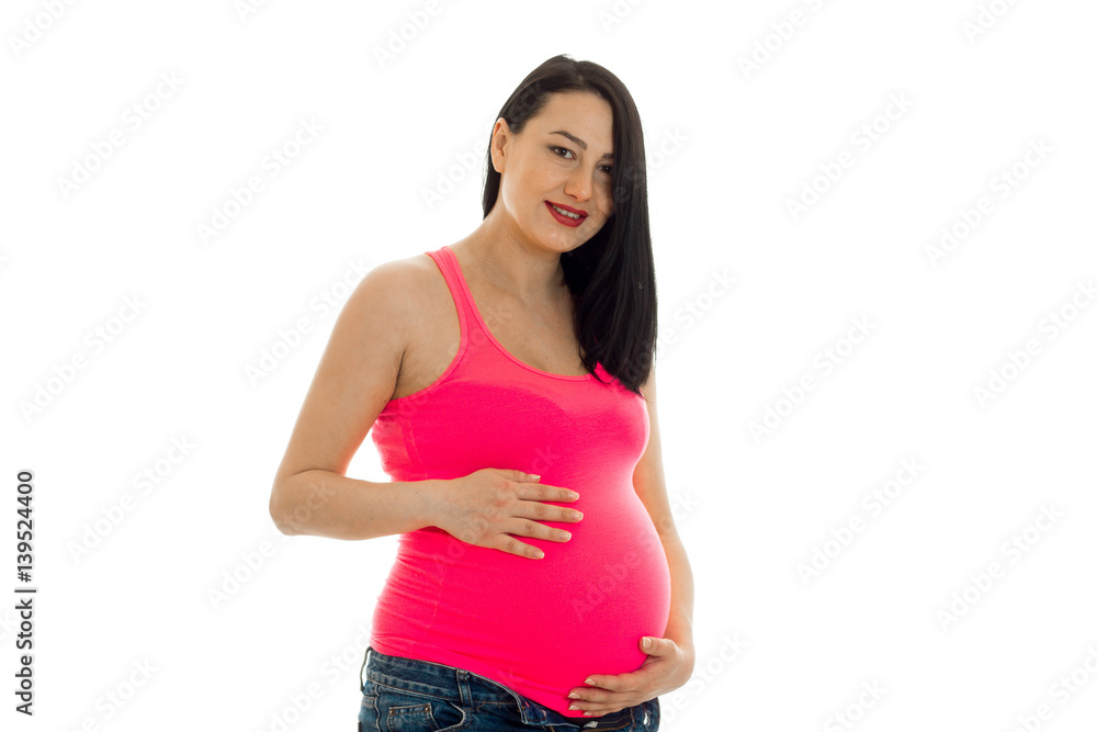 pretty pregnant brunette girl in big belly posing isolated on white background pretty pregnant brunette girl in big belly posing isolated on white background