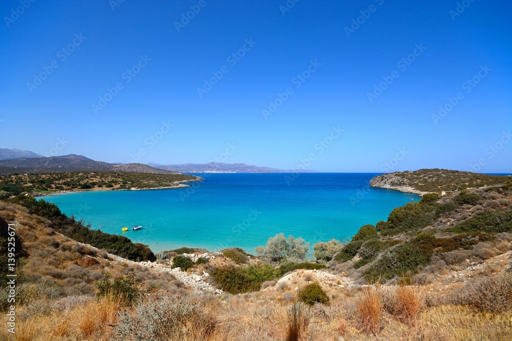 Elevated view of the beach and coastline with mountains to the rear, Istro, Crete.