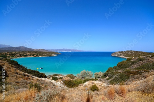 Elevated view of the beach and coastline with mountains to the rear, Istro, Crete. © arenaphotouk
