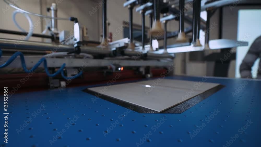 Printing house, the machine to create a hardback cover. Printing machine.
Printing house, the machine to create a hardback cover. Printing machine.