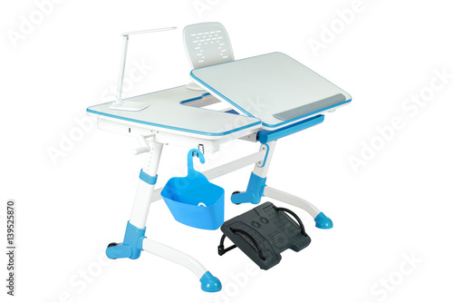 Blue school desk, blue basket, desk lamp and black support under legs
