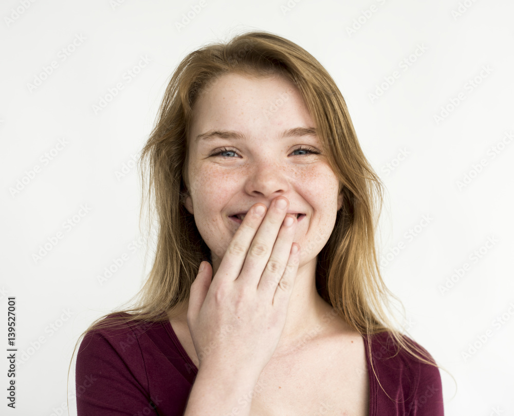 Young girl shy giggle covering mouth portrait Young girl shy giggle covering mouth portrait
